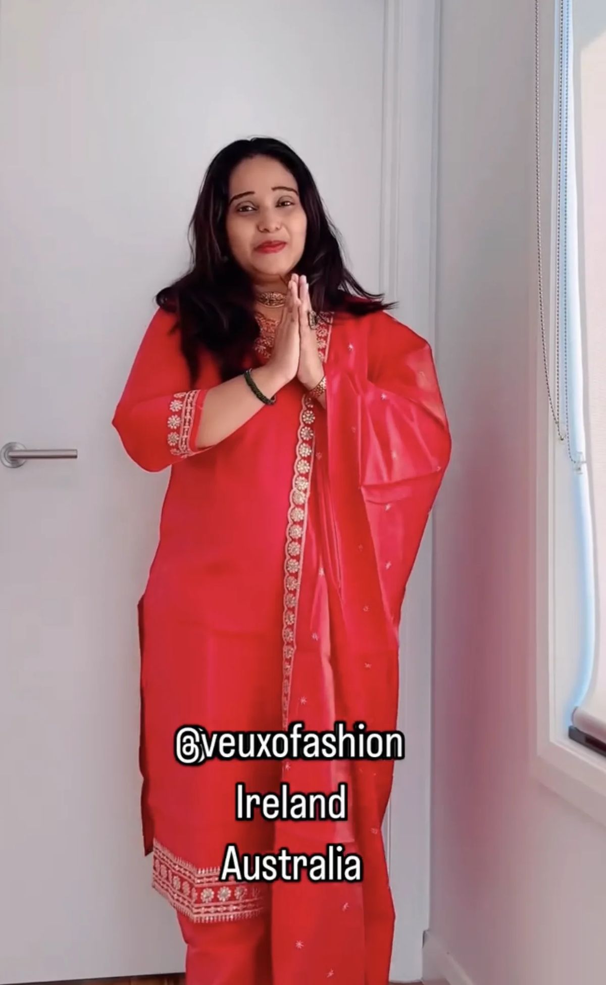 Vibrant Coral Suit with Intricate Gold Embroidery - Image 2