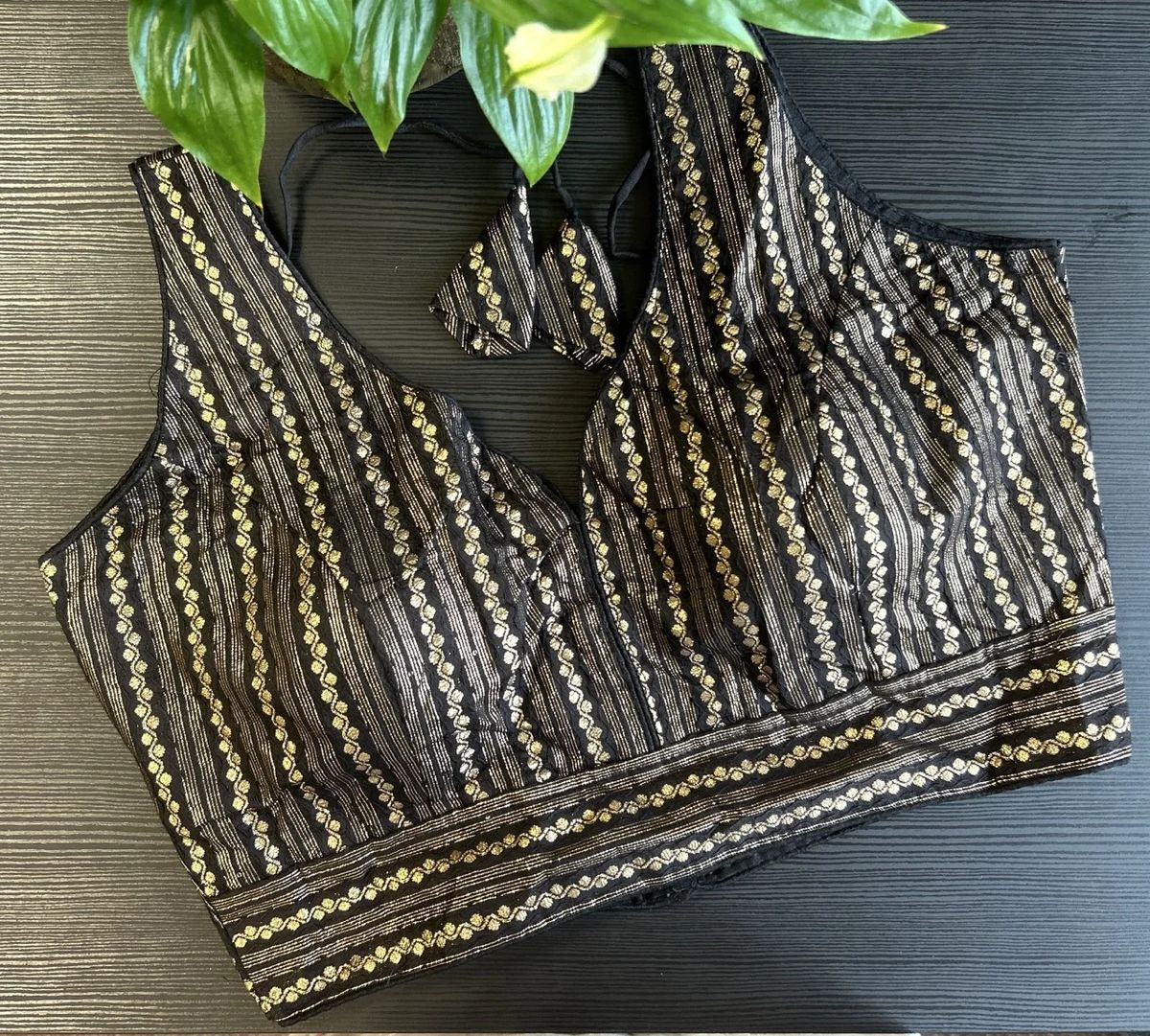 Black and Gold Striped Sleeveless Blouse with Embellished Tassels - Image 2
