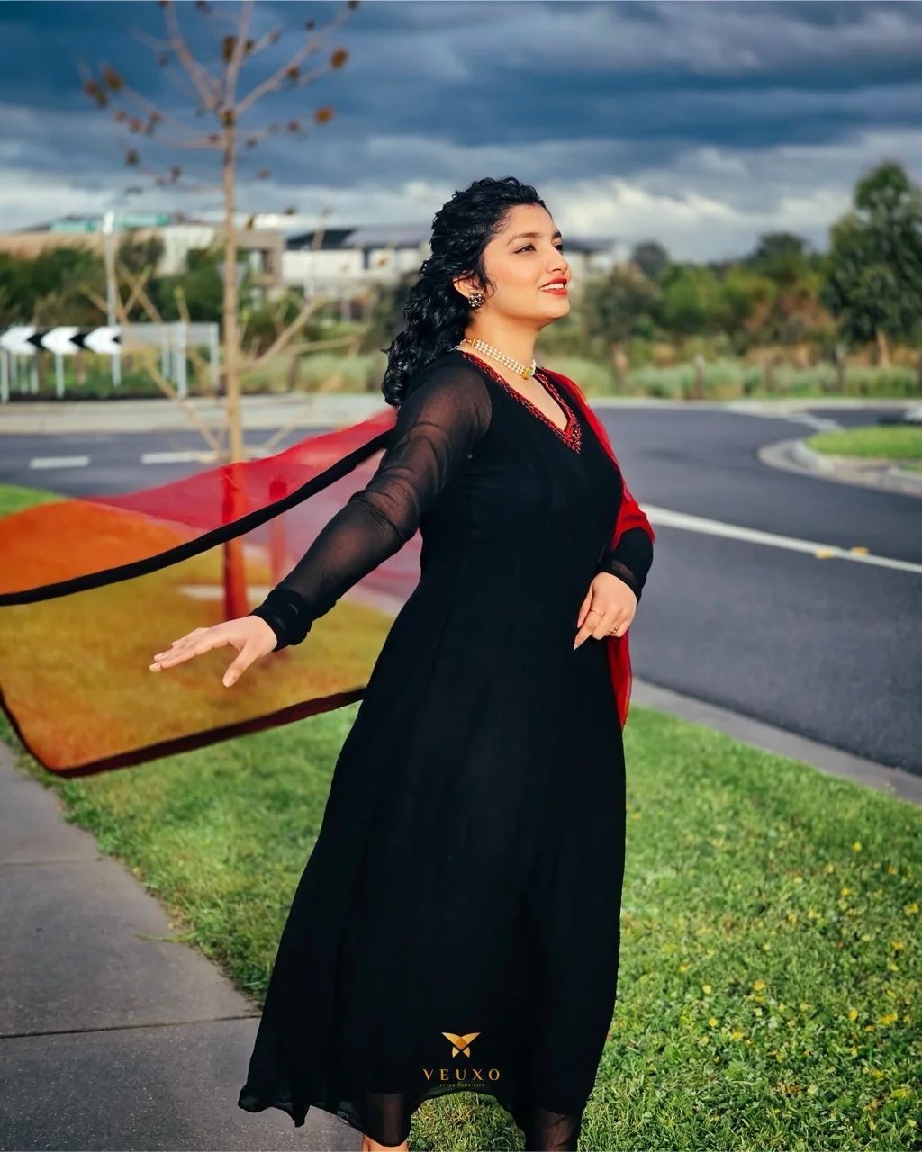 TRESA - Black Anarkali Suit with a subtly embroidered neckline with a Red Dupatta - Image 3