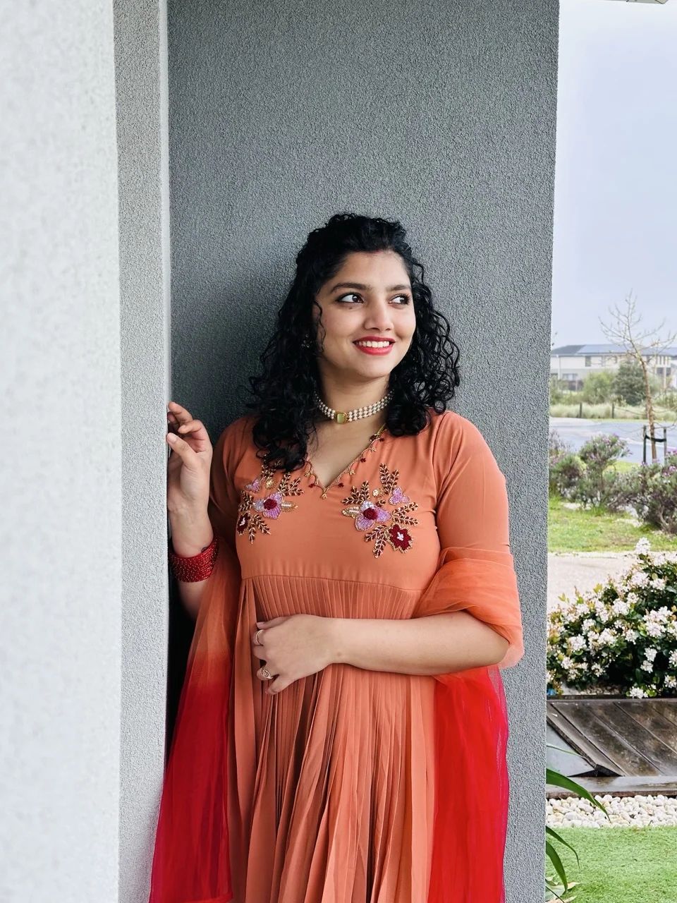 ALAINA - Rust Orange Anarkali Kurta with Multicolor Floral Embroidery on the yoke, paired with a Orange Red Dupatta - Image 3