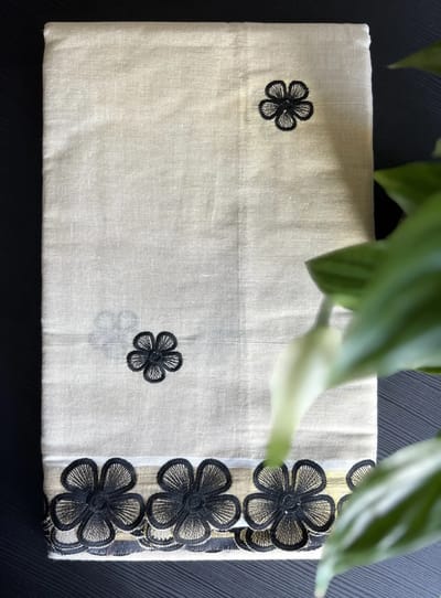White Kasavu Saree with Black Floral Embroidery and Border