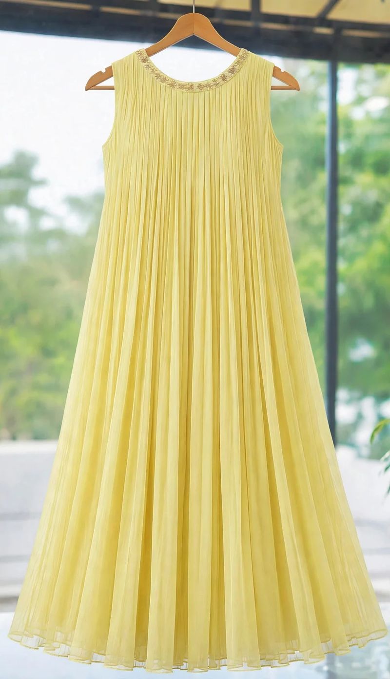 Pastel Lemon Yellow Pleated Salwar with Golden Hand Works in Sleeveless