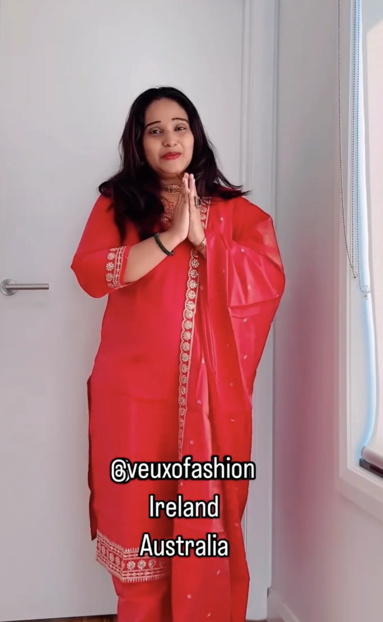  Vibrant Coral Suit with Intricate Gold Embroidery - Image 2