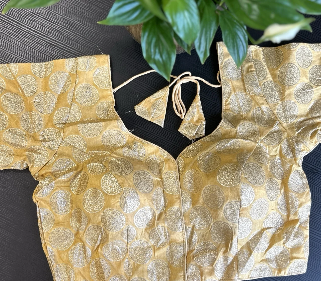 Golden Brocade Blouse with Round Motif Weaving and Tassels