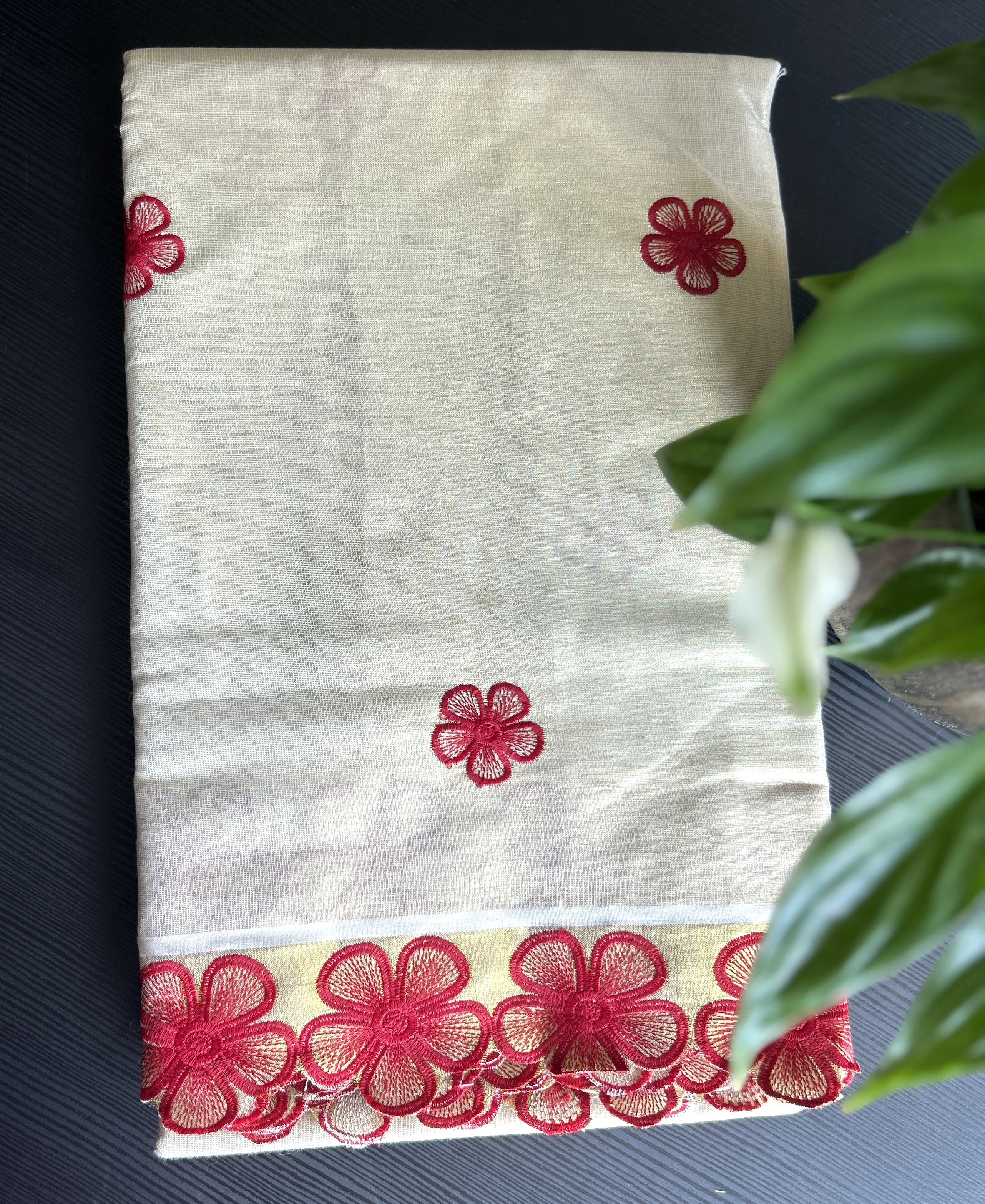 White Kasavu Saree with Red Floral Embroidery and Border