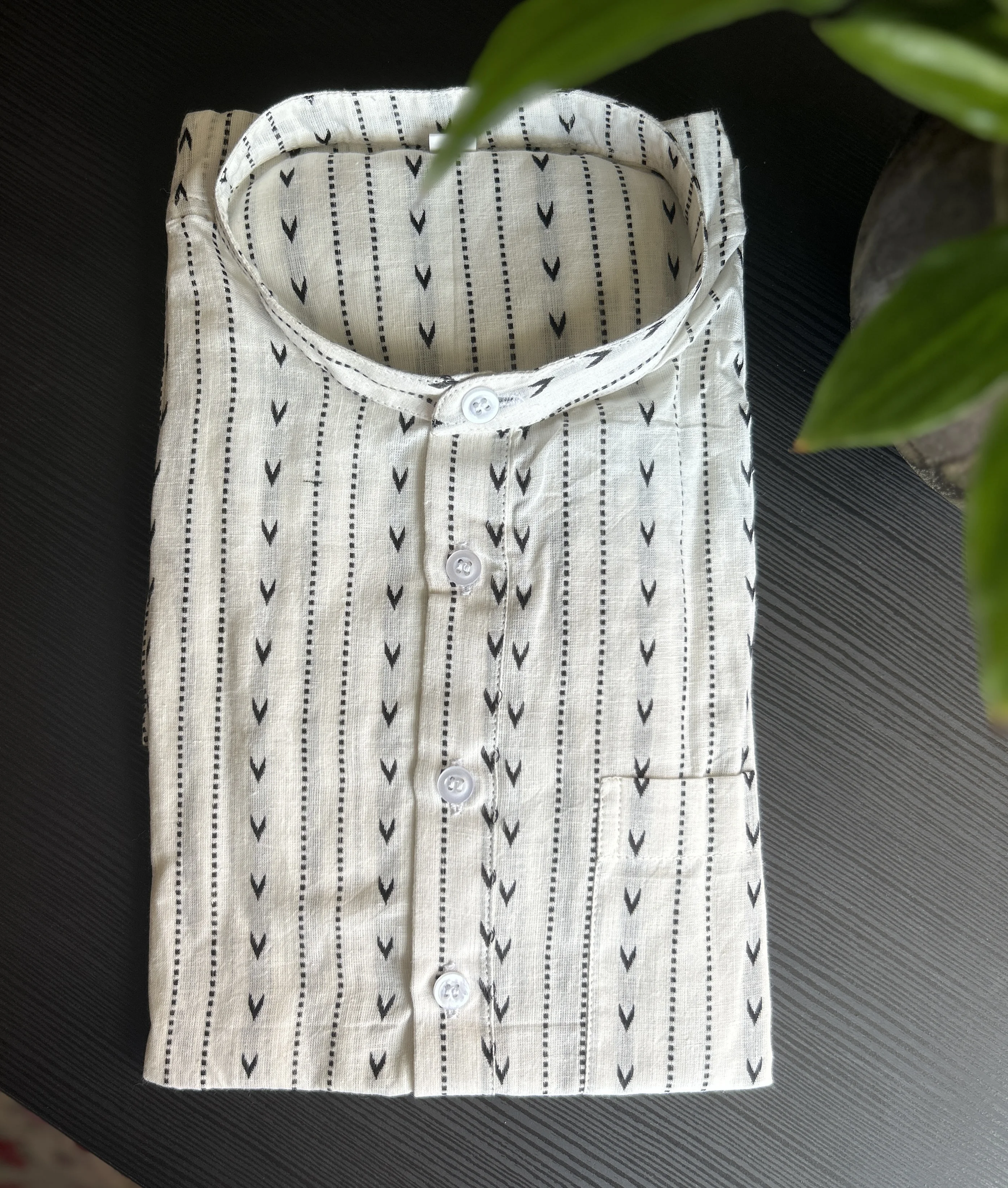  White and Black Striped Shirt with V-Motif Pattern