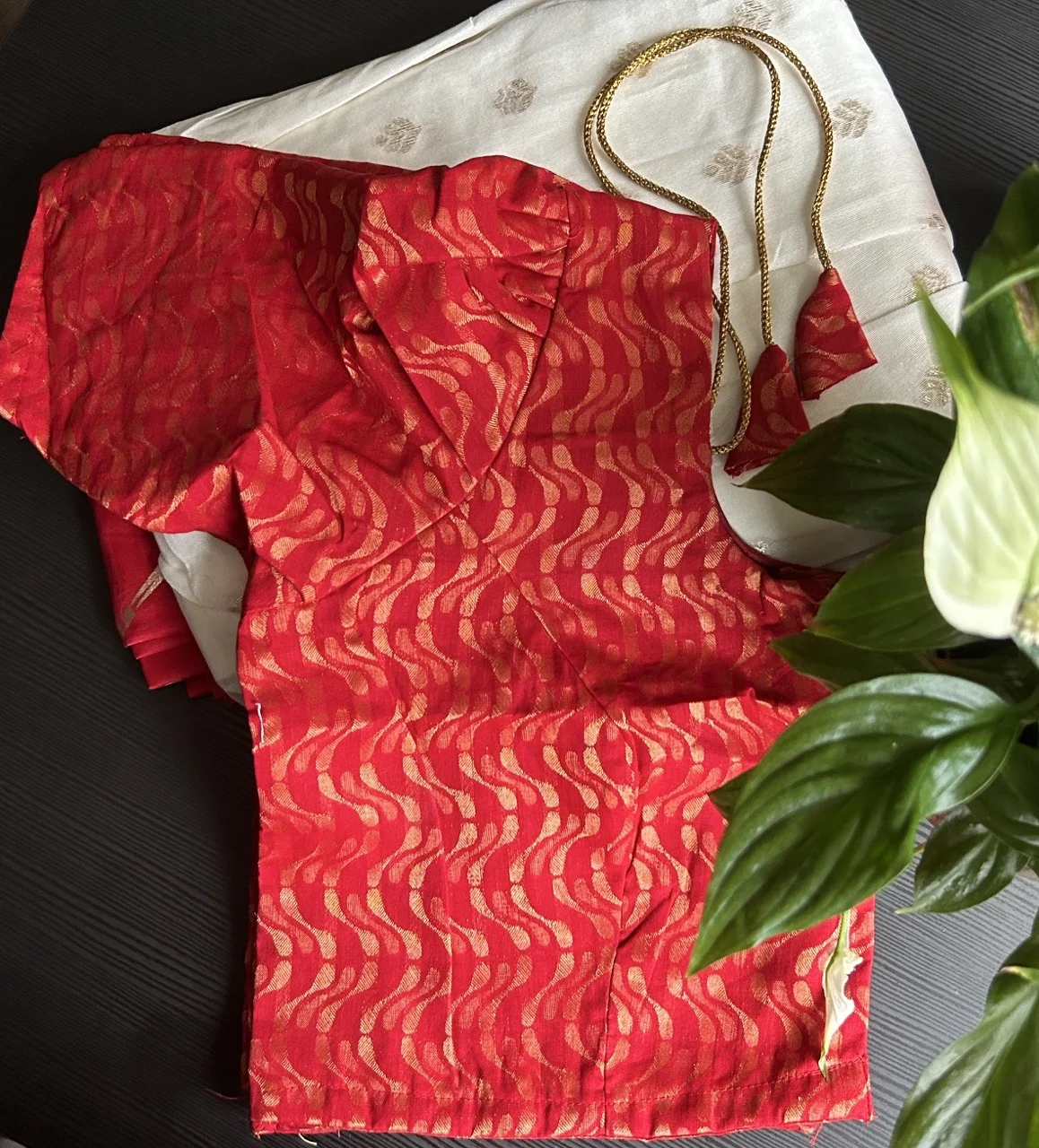 Red and Gold Wave Pattern Brocade Blouse with White and Gold Motif Fabric and Gold Tassels (Dhavani Set)