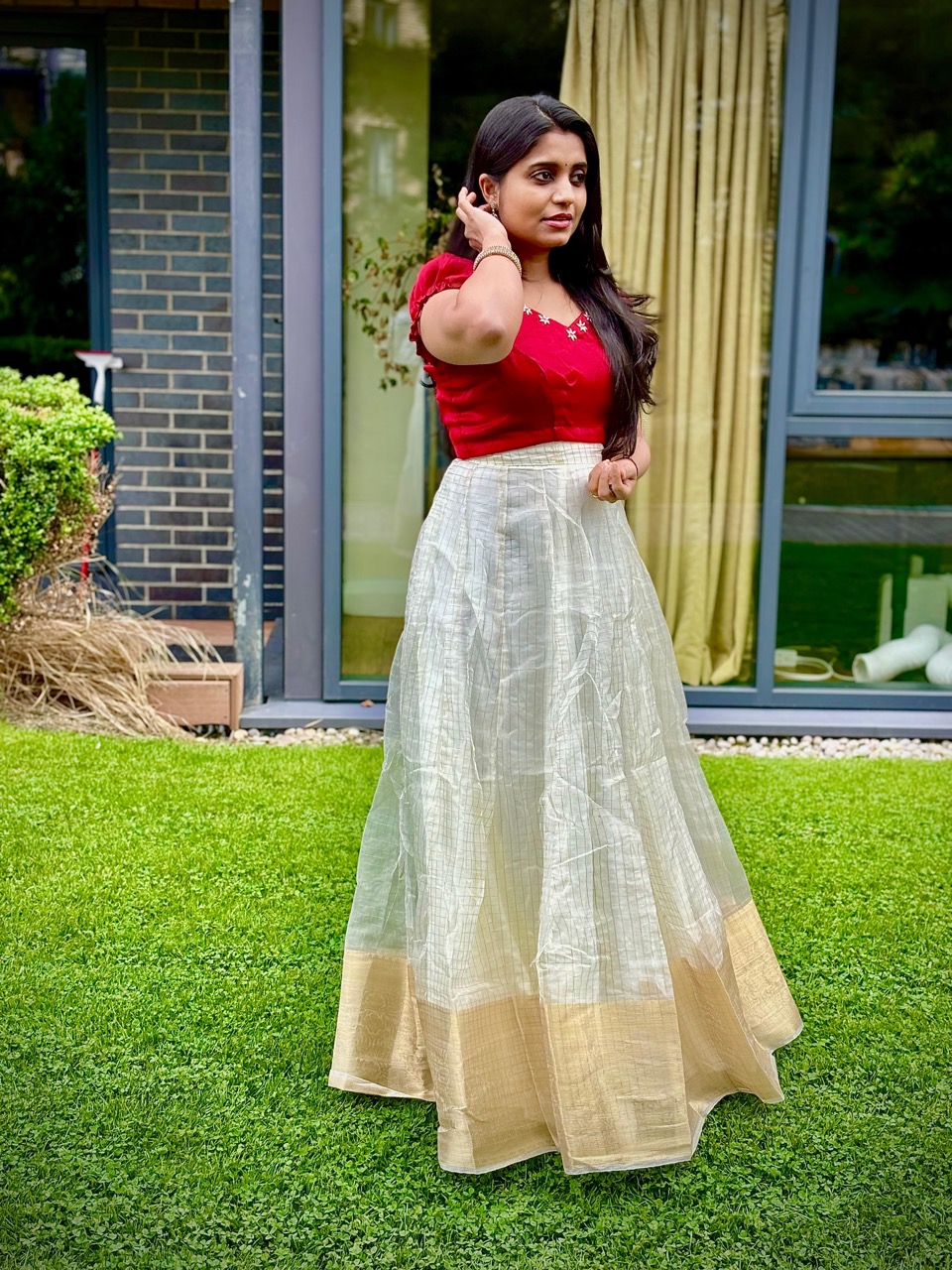 Red Short-Sleeved Blouse with a White and Gold Bordered Skirt - Image 2