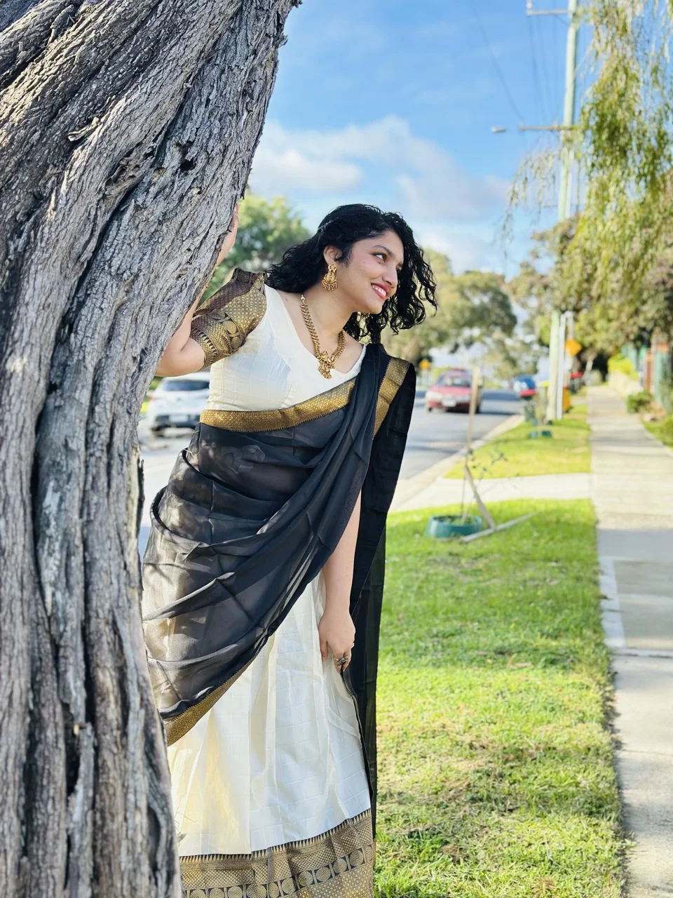 White and Gold Lichi Silk Dhavani Set with Black Dupatta and Gold Brocade Details. - Image 2