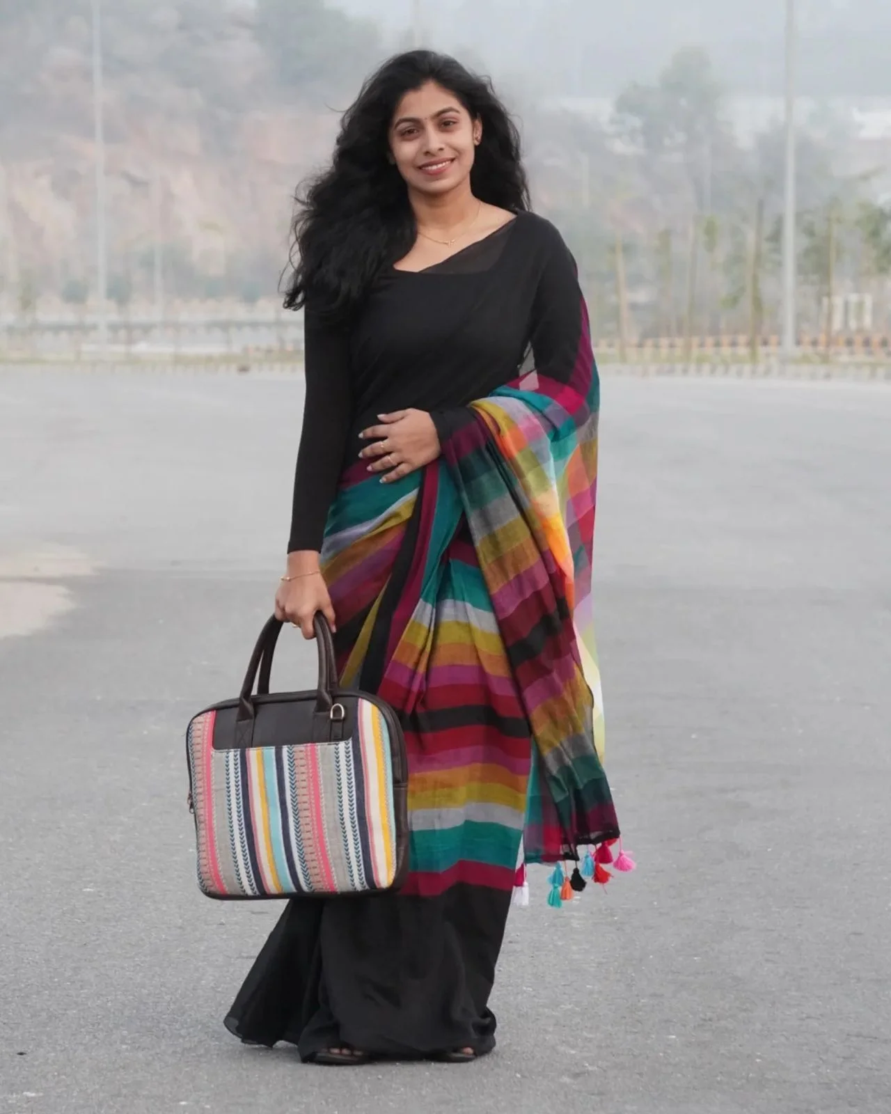 Black Saree with a Multi-colored Striped Pallu