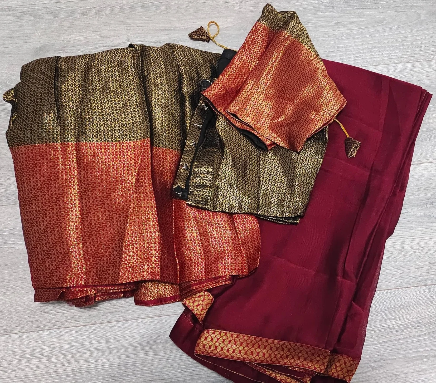 Maroon and Gold Dhavani Set with a Black Brocade Top and a Red Brocade Skirt
