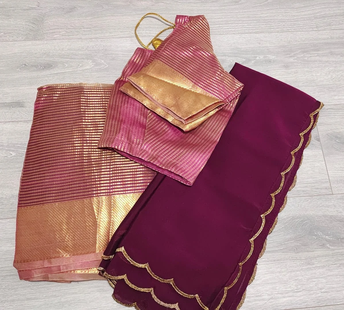 Maroon Dhavani Set with Gold Scalloped Blouse and Striped Pink and Gold Shawl