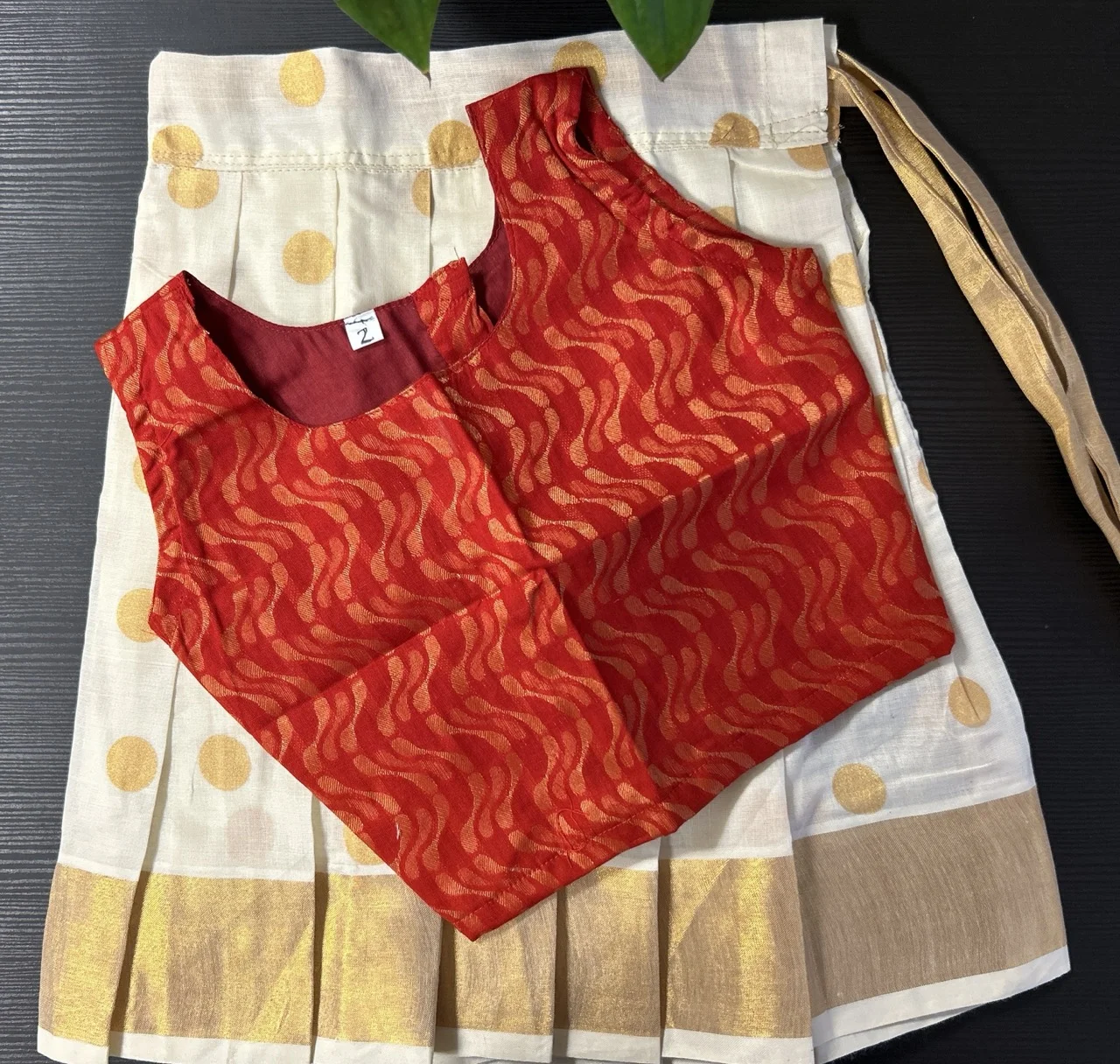 Kids Red and Gold Wave-Patterned Blouse and White Polka Dot Skirt with Gold Border