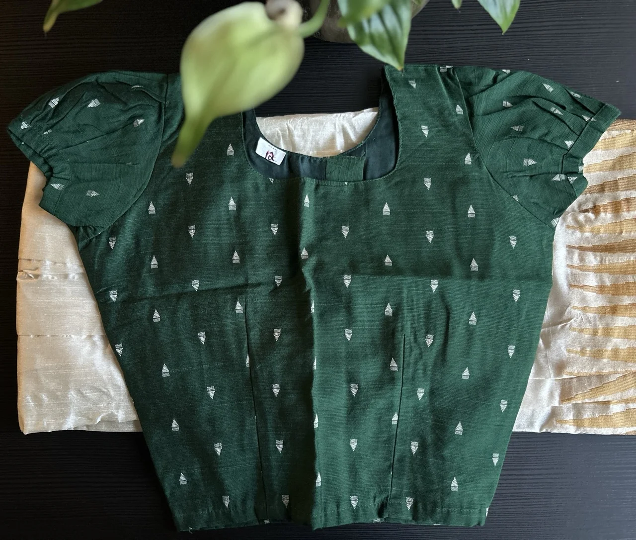 Kids Green Blouse with White Triangular Motifs and Cream and Gold Skirt with a Brocade Border - Image 2