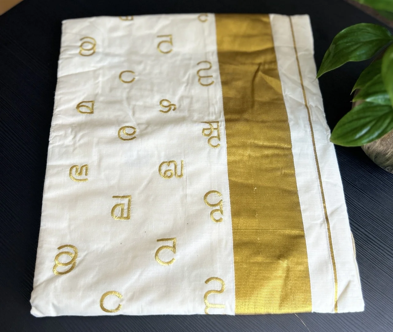 White and Gold Kerala Saree with Malayalam Script Motifs and a Matching Blouse. - Image 3