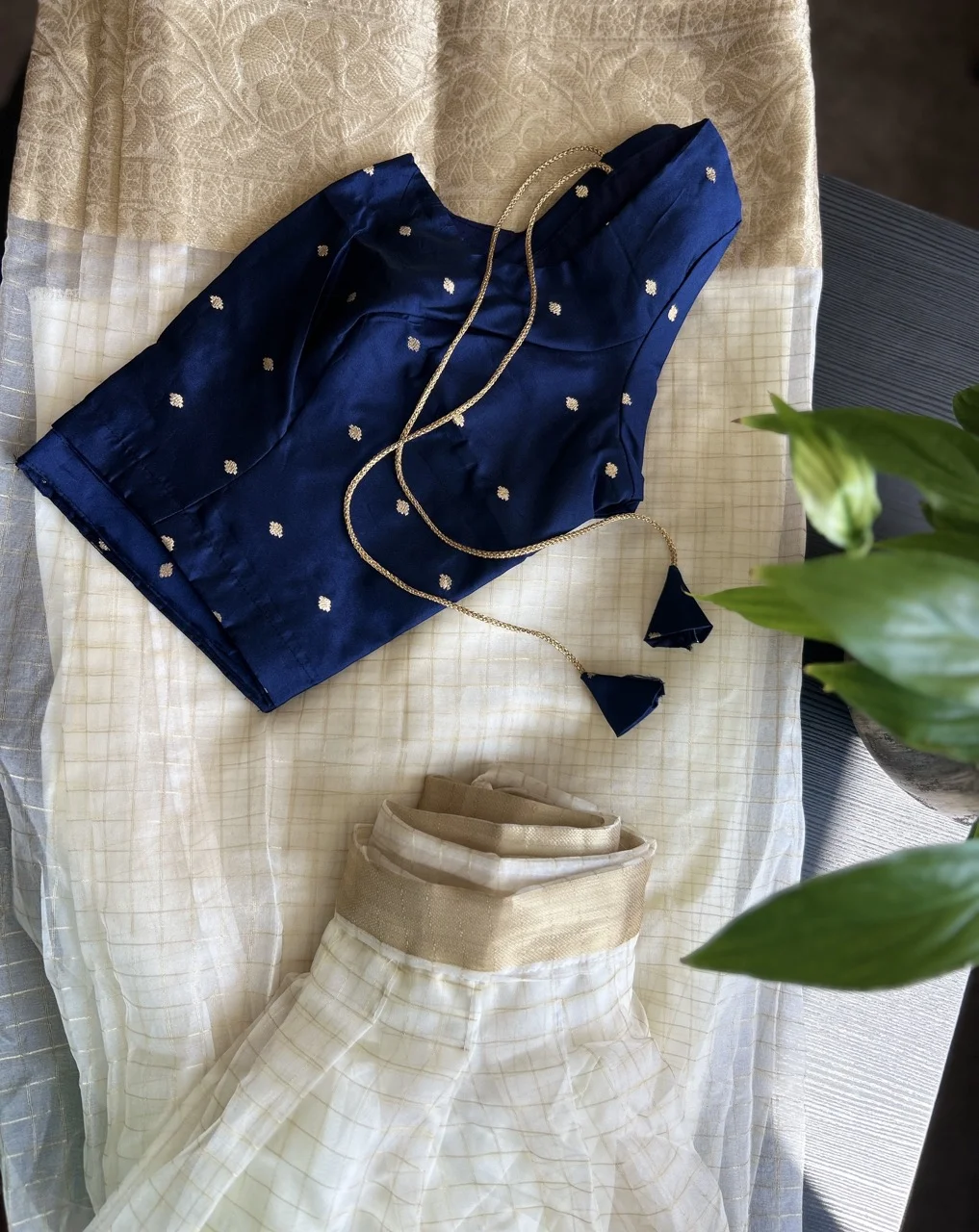 Navy Blue Blouse with Gold Motifs and White and Gold Checked Skirt - Image 3