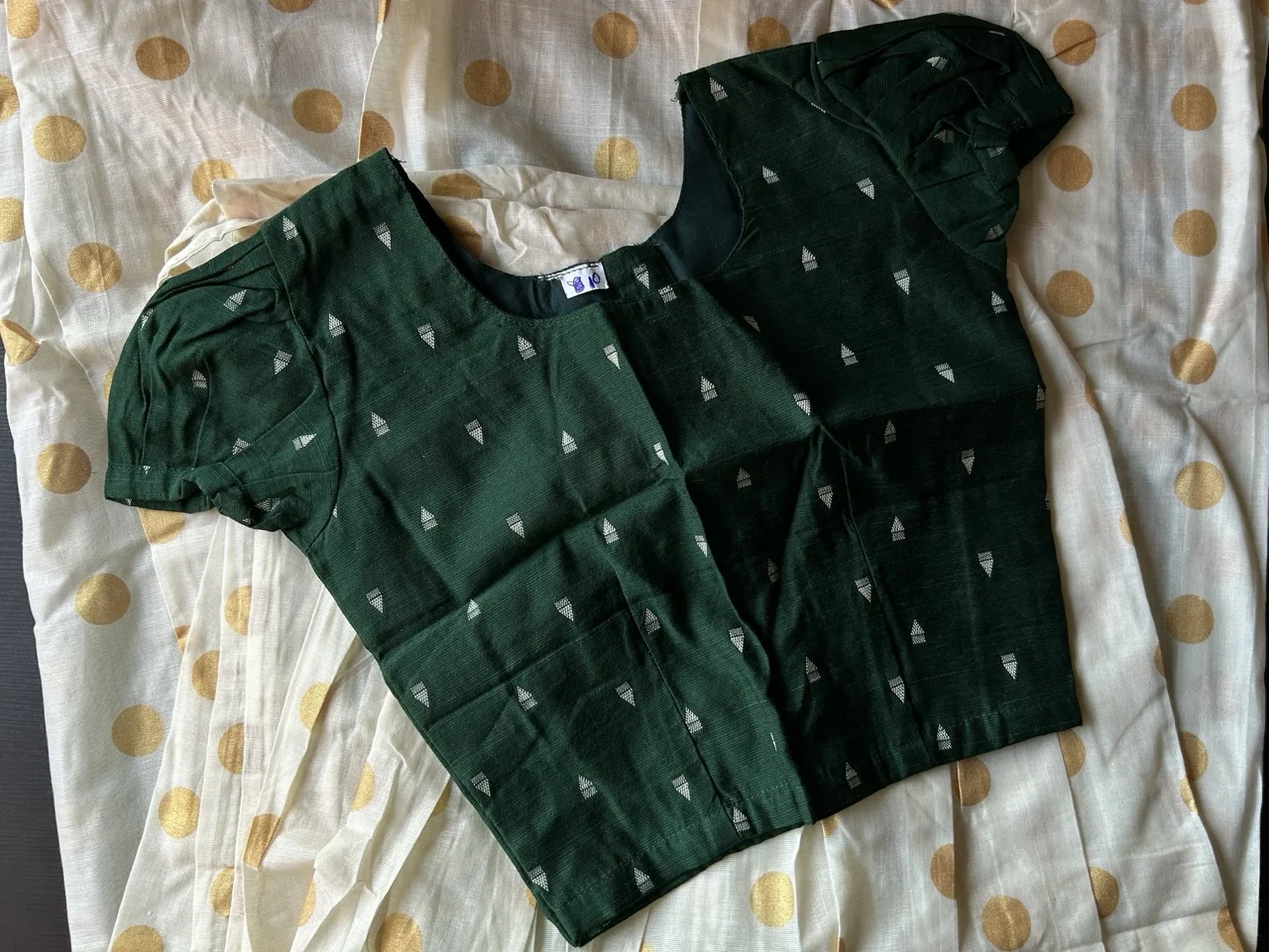 Kids Green Blouse with White Triangular Motifs and White and Gold Polka Dot Skirt