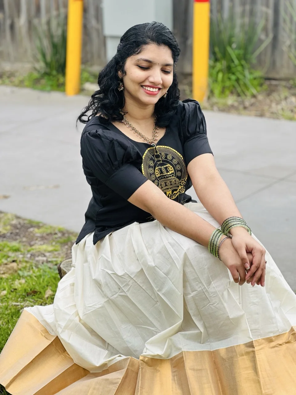Black Top with Gold Circular Print and White Dhavani Skirt with a Gold Border - Image 2