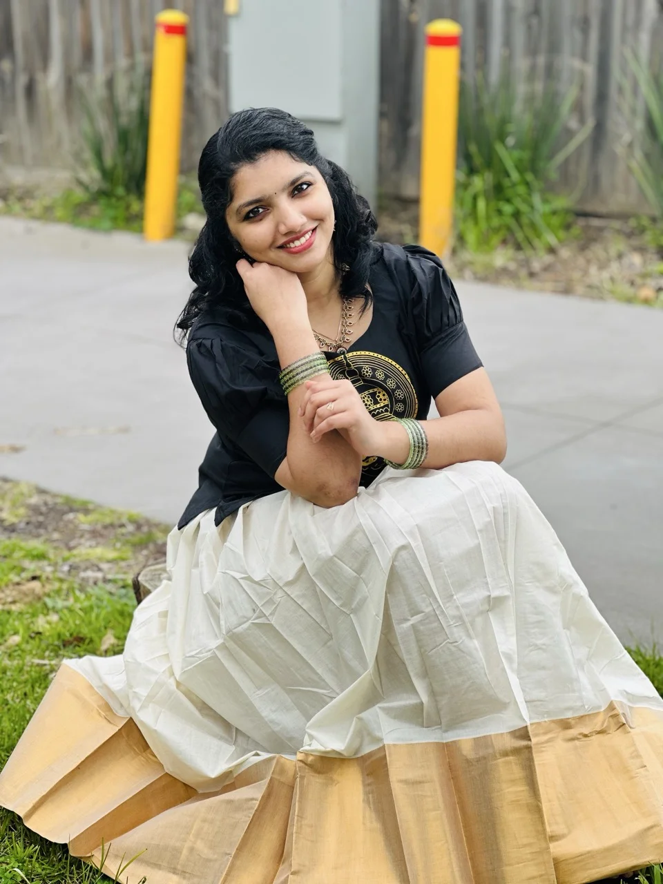Black Top with Gold Circular Print and White Dhavani Skirt with a Gold Border