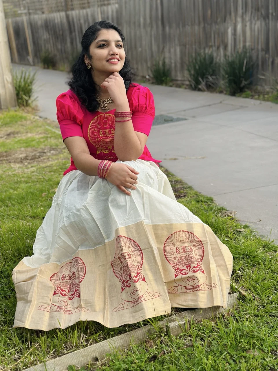 Pink Top with Gold Circular Print and White Dhavani Skirt with a Kathakali-Motif Border - Image 3