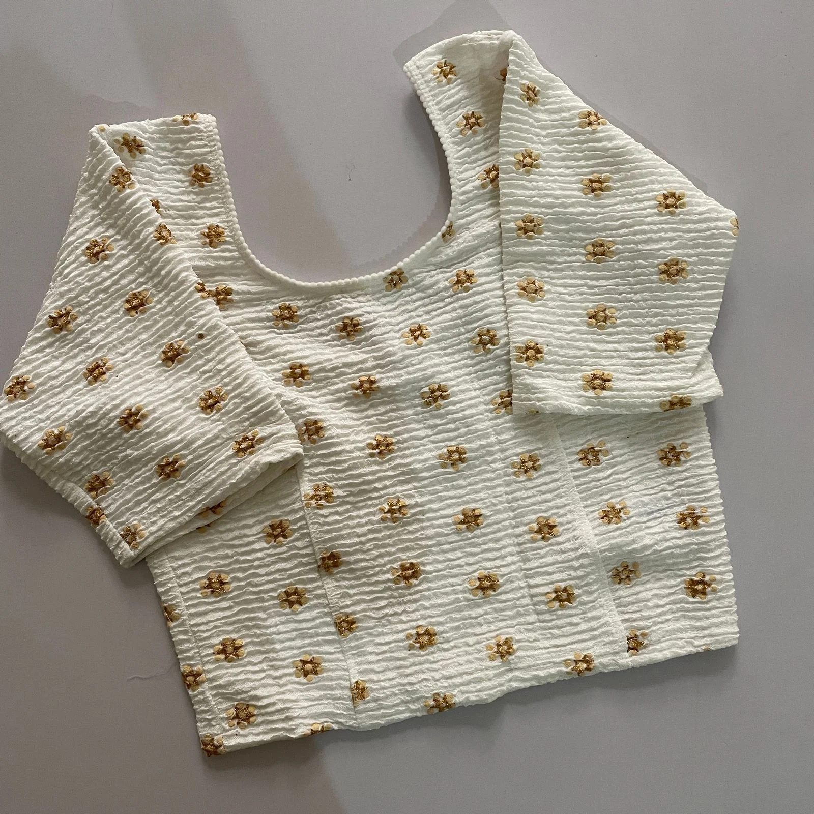 White Textured Stretchable Blouse with Gold Floral Motifs