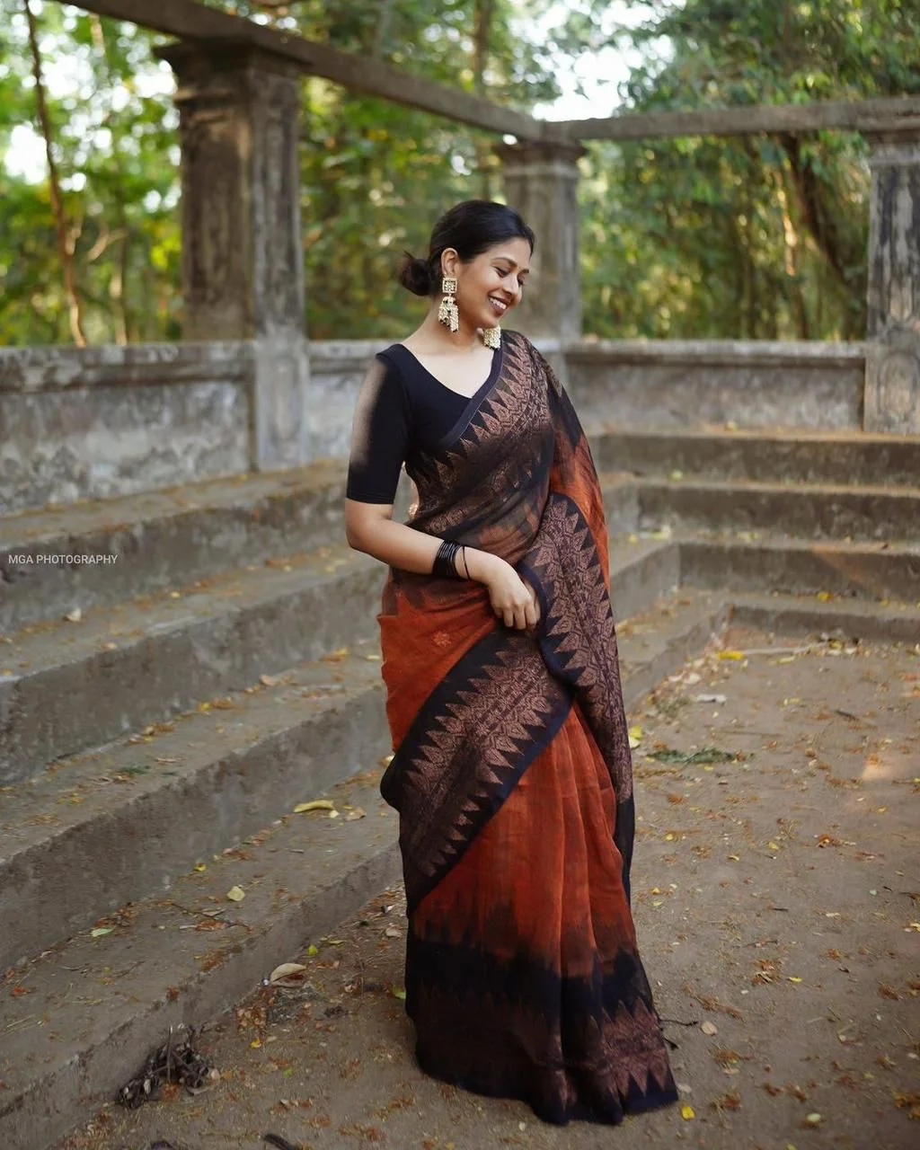 Black and copper-toned saree with floral and geometric motifs - Image 3