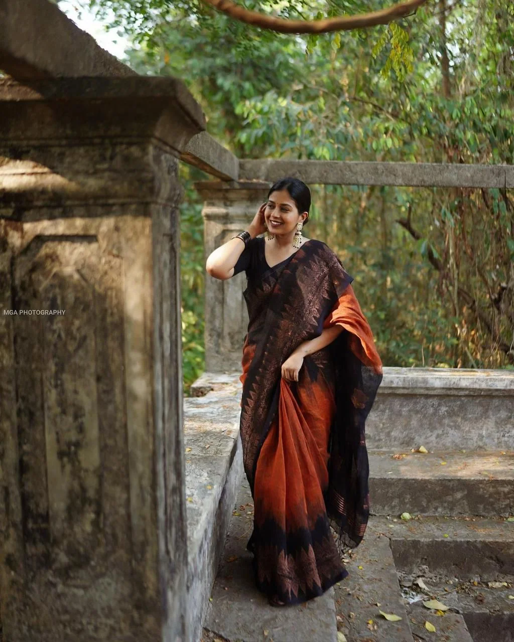 Black and copper-toned saree with floral and geometric motifs - Image 4