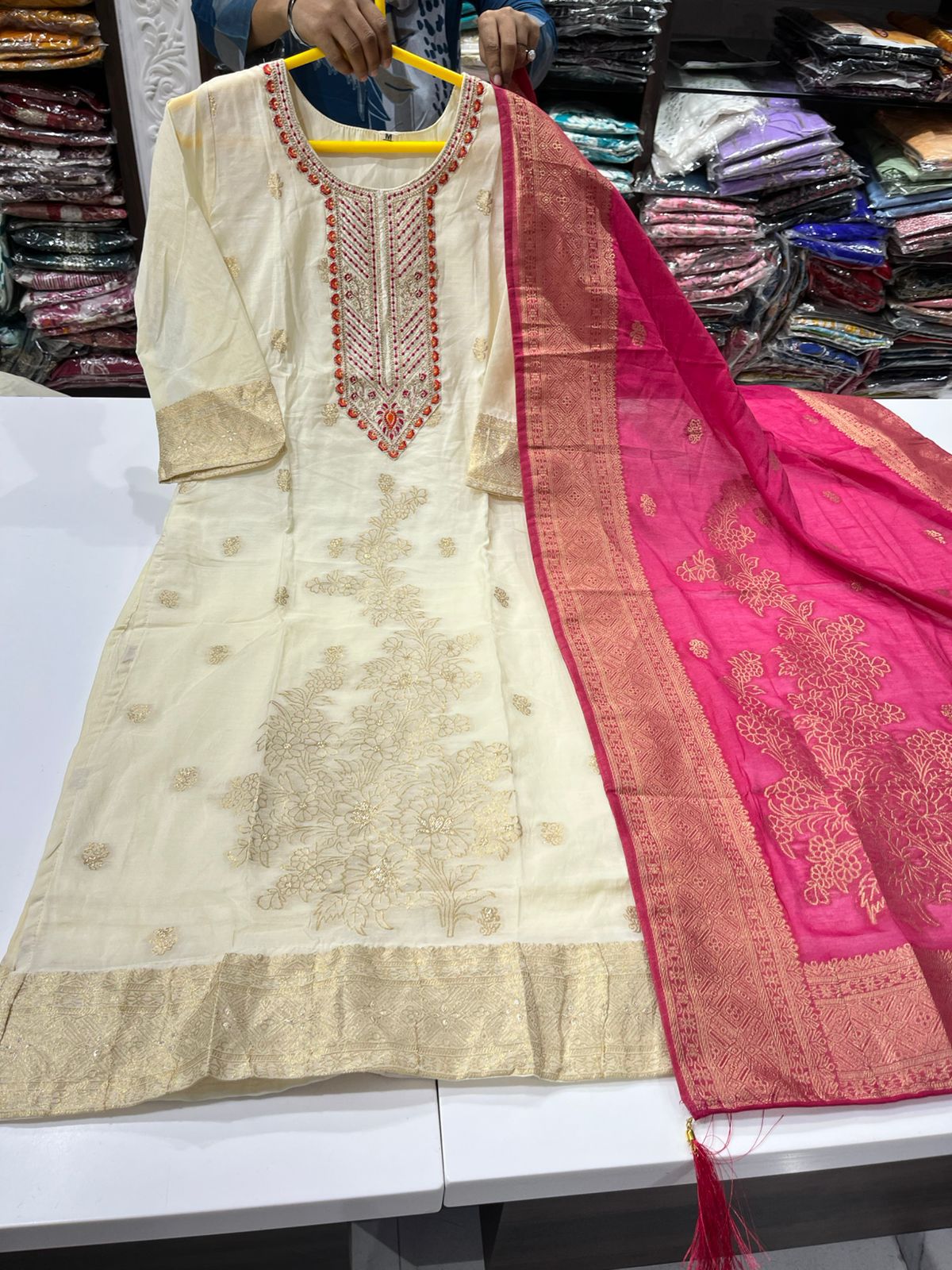  Ivory Kurta with Gold Floral Embroidery and Zari Border, paired with a Hot Pink and Gold Brocade Dupatta