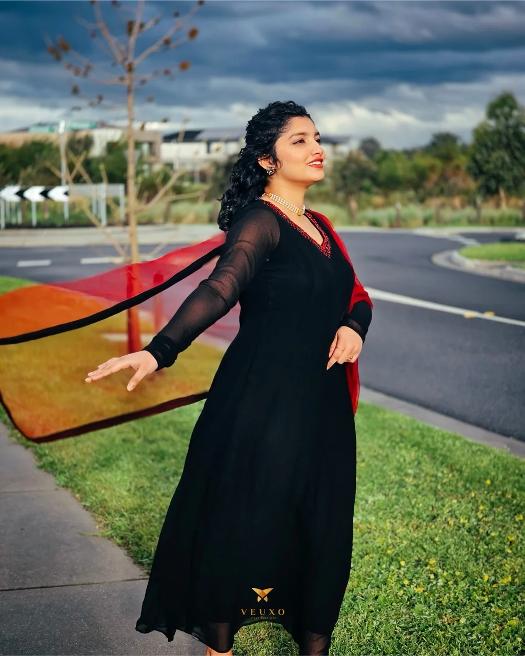 TRESA - Black Anarkali Suit with a subtly embroidered neckline with a Red Dupatta - Image 3