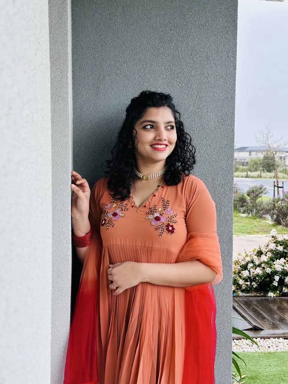 ALAINA - Rust Orange Anarkali Kurta with Multicolor Floral Embroidery on the yoke, paired with a Orange Red Dupatta - Image 3