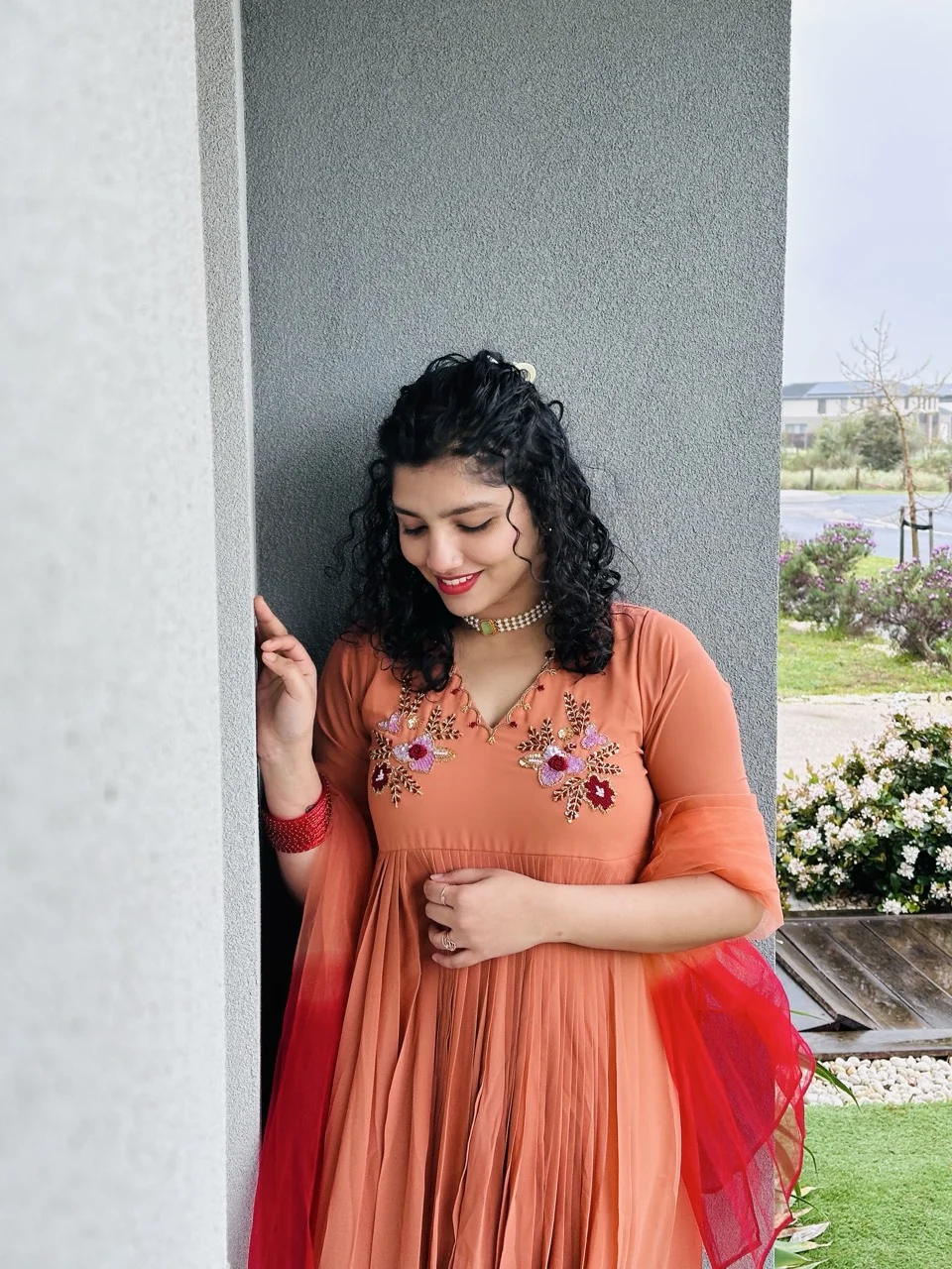 ALAINA - Rust Orange Anarkali Kurta with Multicolor Floral Embroidery on the yoke, paired with a Orange Red Dupatta - Image 2