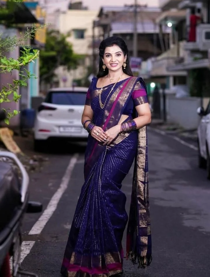 Navy Blue Striped Saree with a rich Gold and Maroon Zari Border with Blouse