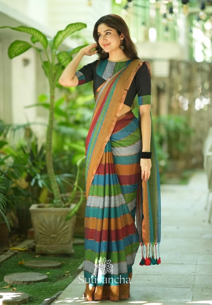 Multi-Color Striped Saree with horizontal bands of various earthy and rich tones, including blue, green, grey, and terracotta
