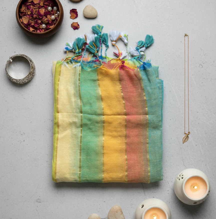 Pastel Mulcotton Saree with horizontal Ombre Stripes in soft shades of light green, pale yellow, and peach